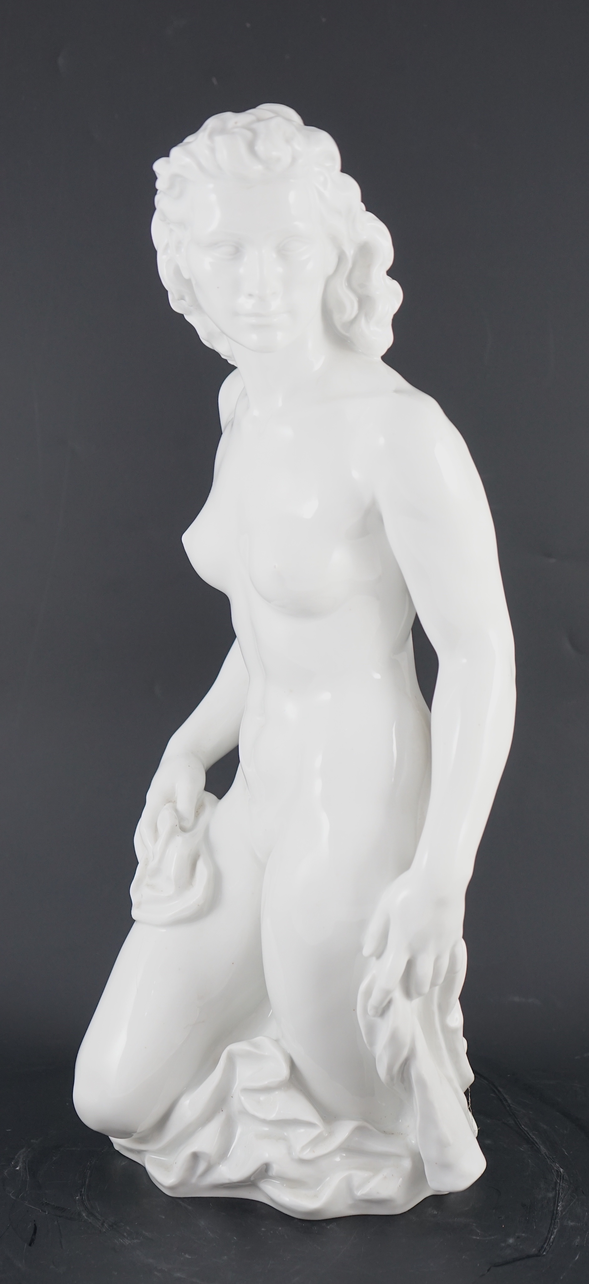 Robert Ullmann (1903-1966) for Meissen, a large white glazed porcelain three-quarter length figure of a nude woman, 50.5cm high